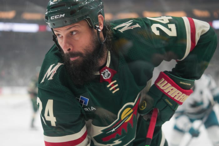 Mar 3, 2024; Saint Paul, Minnesota, USA; Minnesota Wild defenseman Zach Bogosian (24) plays the puck in his defensive zone against the San Jose Sharks in the first period at Xcel Energy Center.